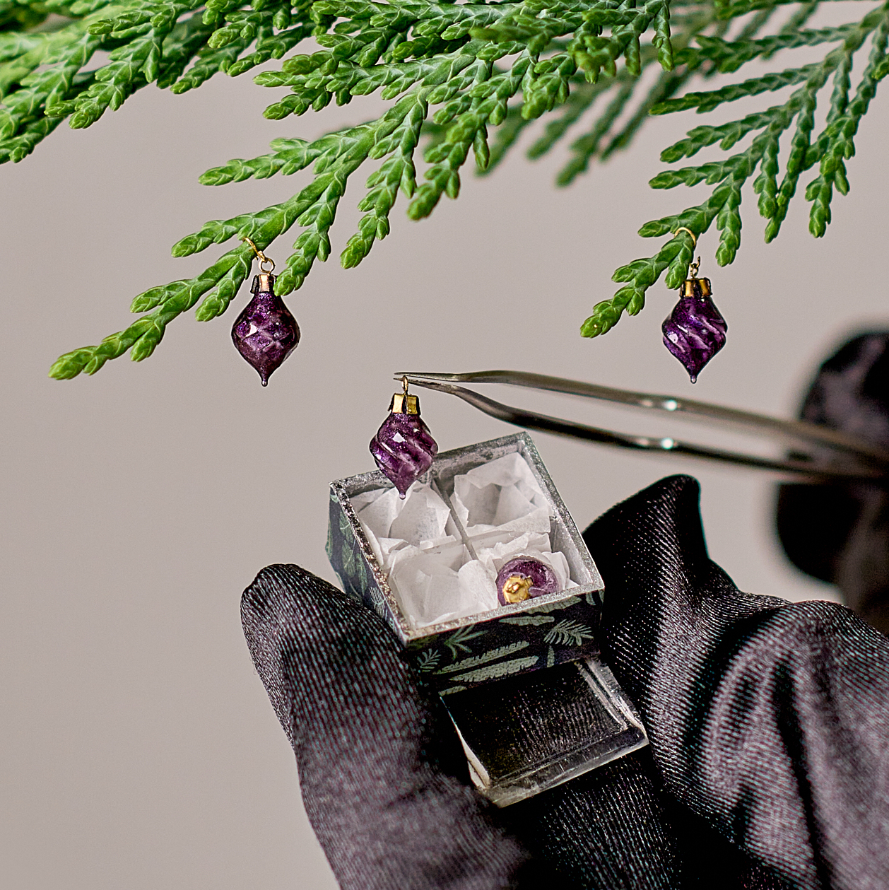 Christmas ornaments set in the box. Violet with indigo sparkling effect 4 ornaments.