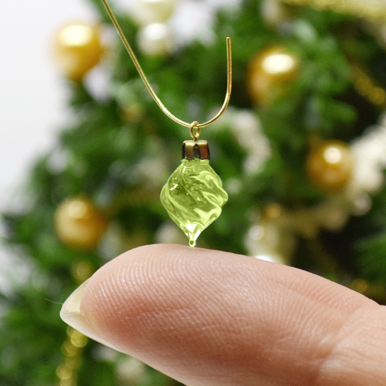 Xmas ornament. Painted. Drop twisted green.