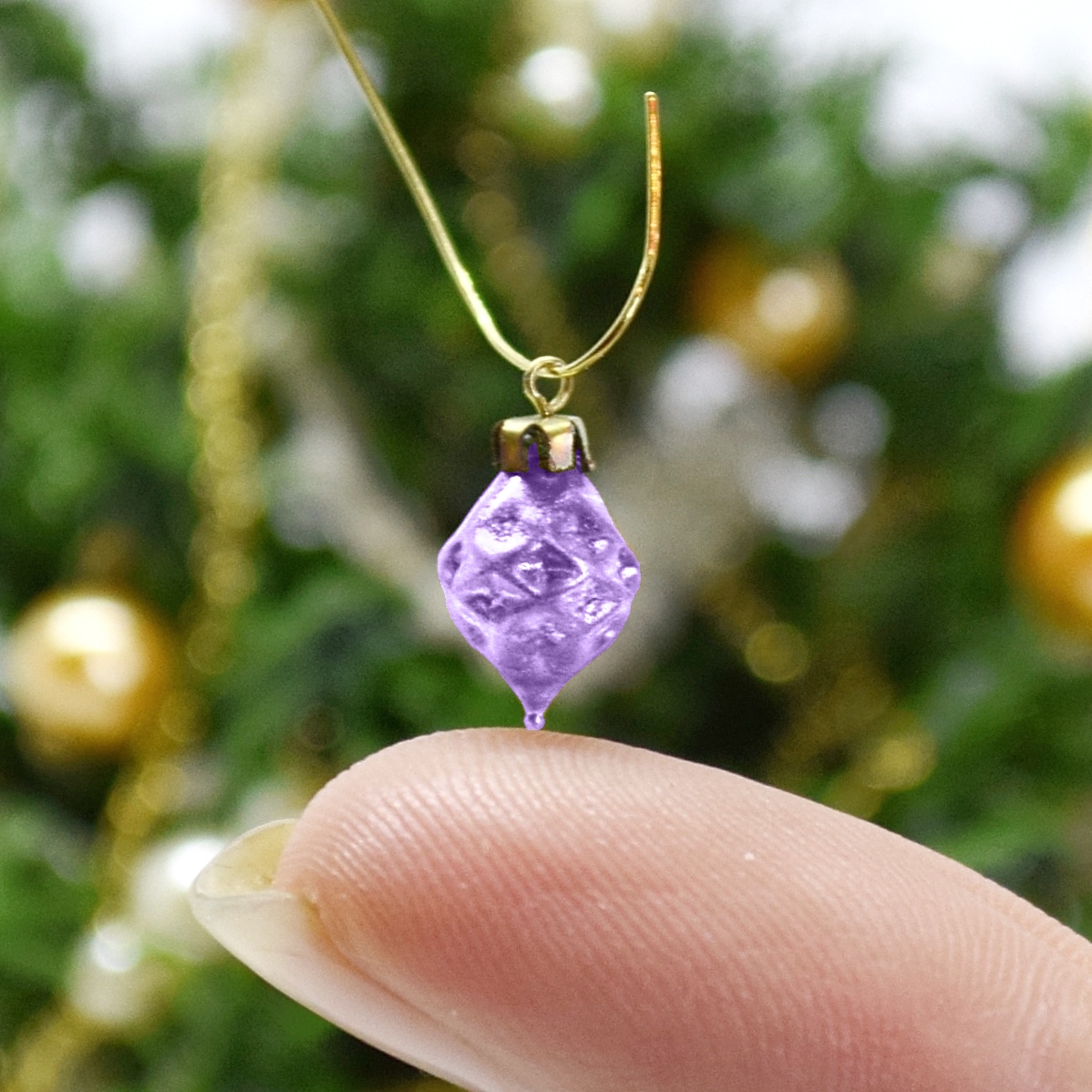 Xmas ornament. Painted. Drop rhombus purple.