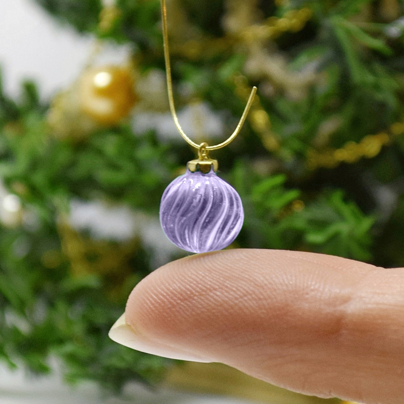 Xmas ornament. Painted. Bauble twisted purple.