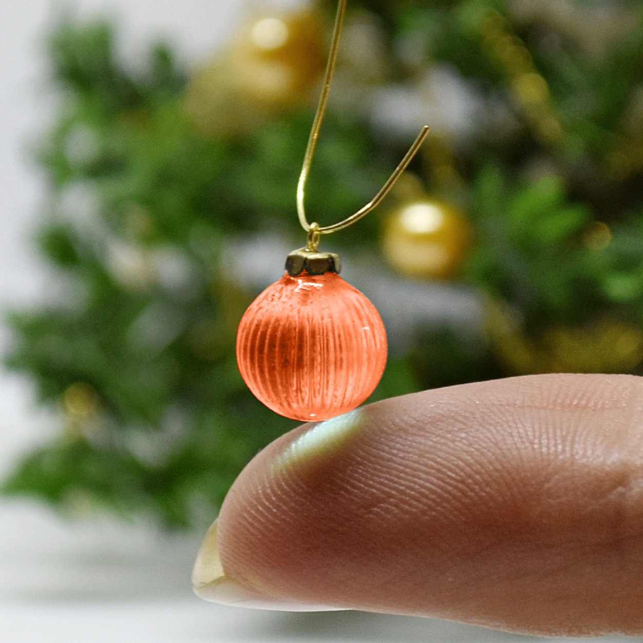 Xmas ornament. Painted. Bauble patterned red.
