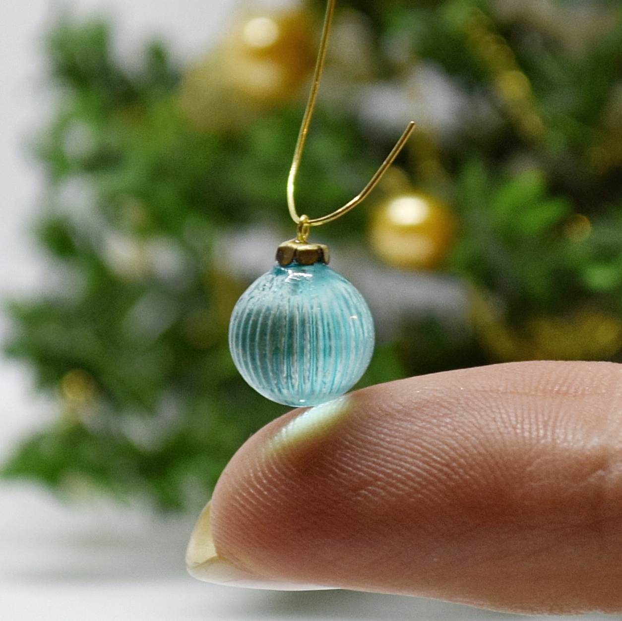Xmas ornament. Painted. Bauble patterned blue.