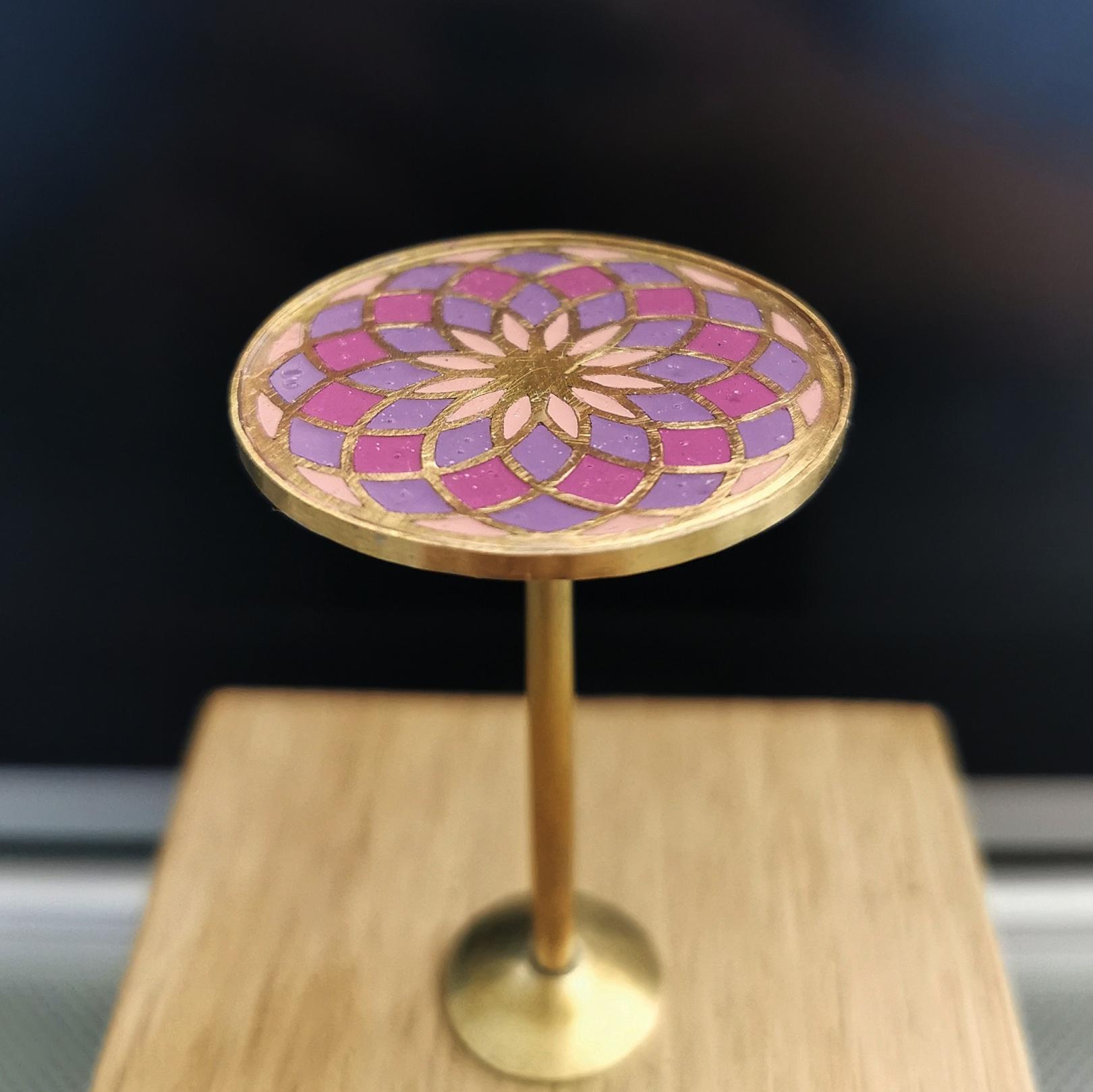 Round enameled table. Purple-pink